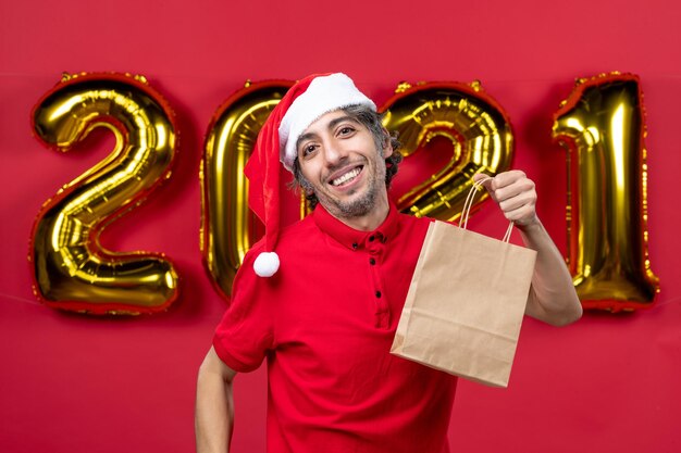 Expressive young man posing for winter holidays