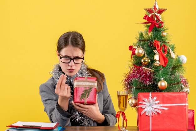 Expressive young woman posing for Christmas