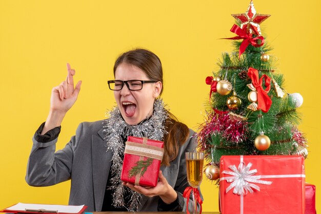 Expressive young woman posing for Christmas