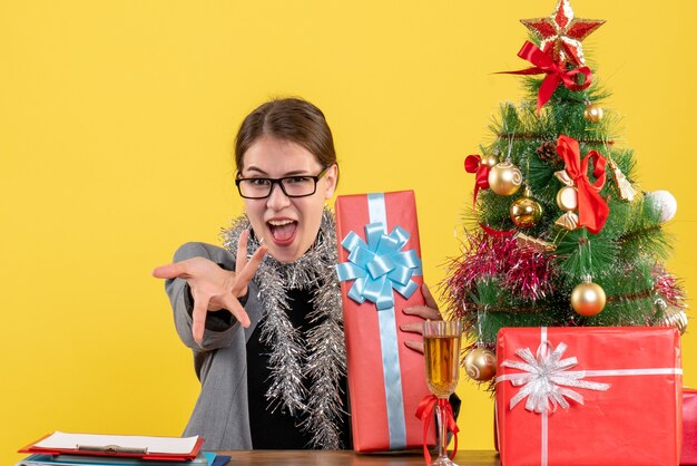 Expressive young woman posing for Christmas