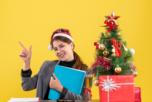 Expressive young woman posing for Christmas