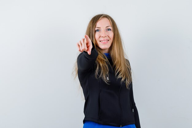 Expressive young woman posing in the studio