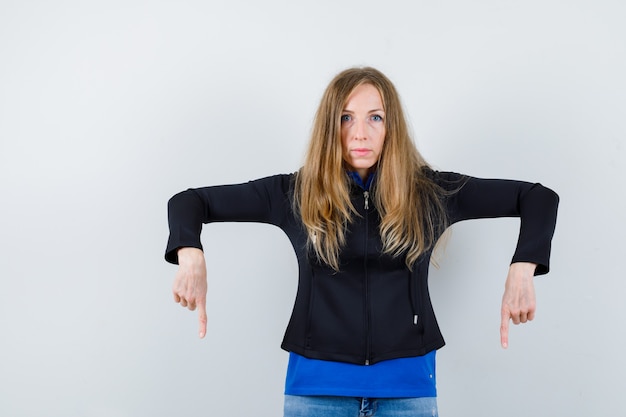 Expressive young woman posing in the studio