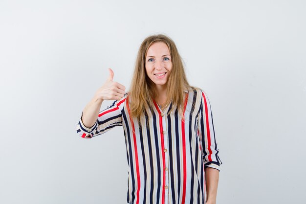 Expressive young woman posing in the studio