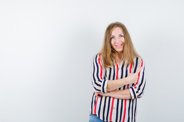 Expressive young woman posing in the studio