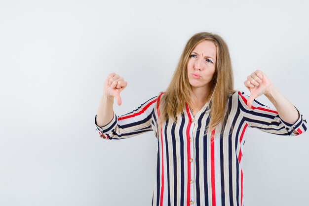 Expressive young woman posing in the studio