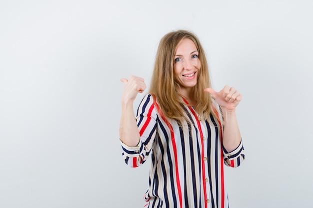 Expressive young woman posing in the studio