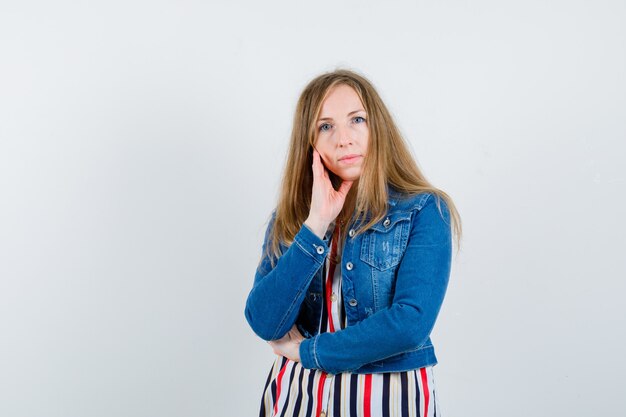 Expressive young woman posing in the studio