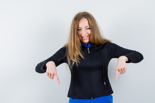 Expressive young woman posing in the studio