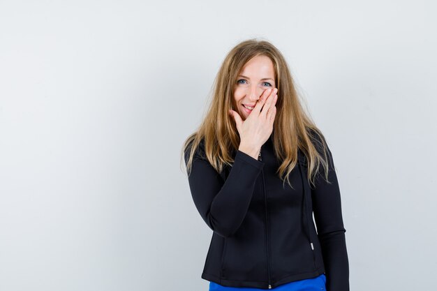 Expressive young woman posing in the studio