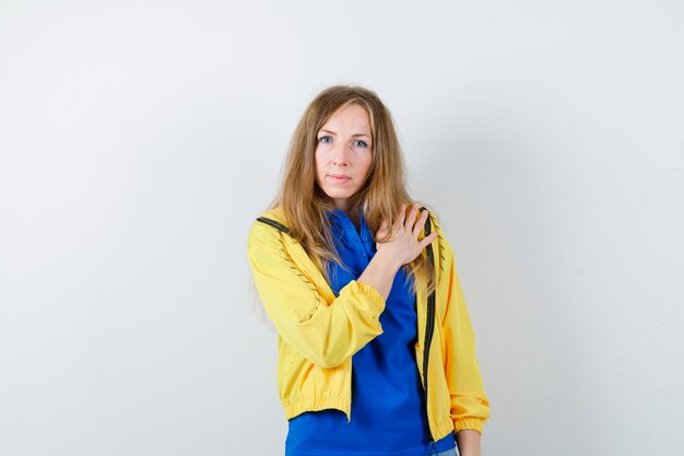 Expressive young woman posing in the studio