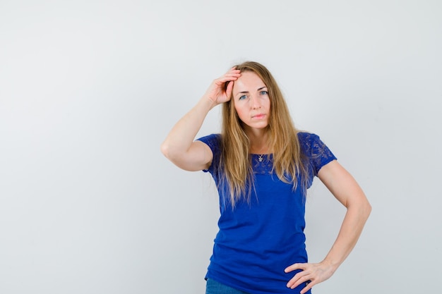 Expressive young woman posing in the studio