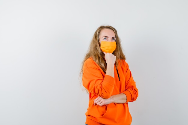 Expressive young woman posing in the studio