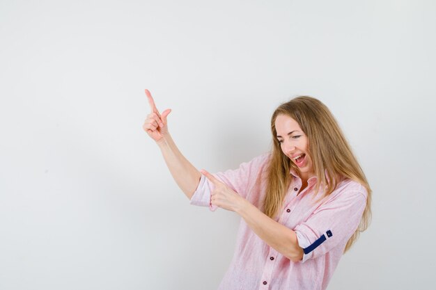 Expressive young woman posing in the studio