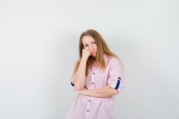 Expressive young woman posing in the studio