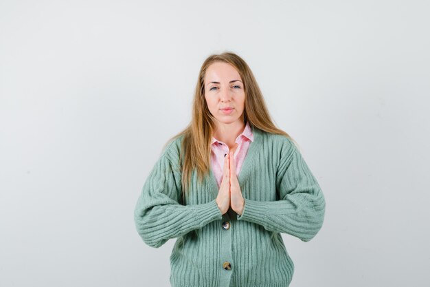 Expressive young woman posing in the studio