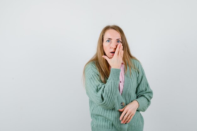 Expressive young woman posing in the studio