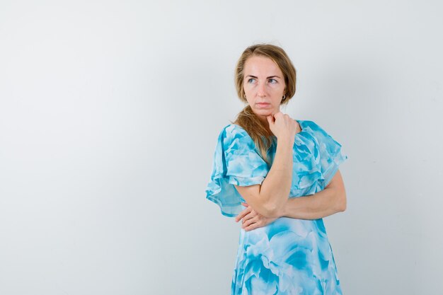 Expressive young woman posing in the studio