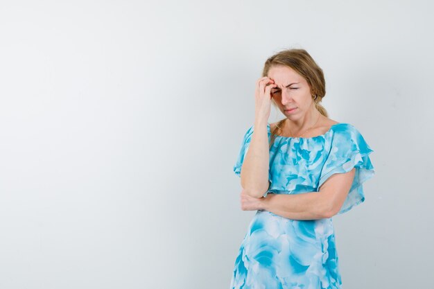 Expressive young woman posing in the studio