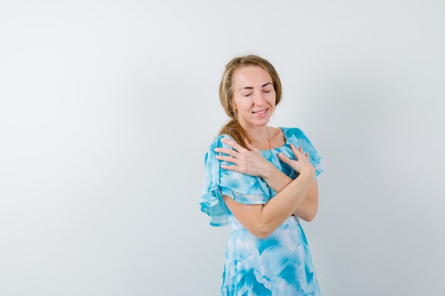 Expressive young woman posing in the studio