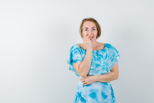 Expressive young woman posing in the studio