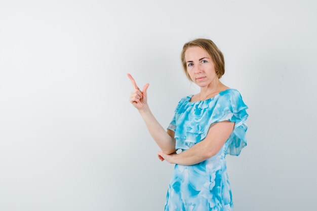 Expressive young woman posing in the studio