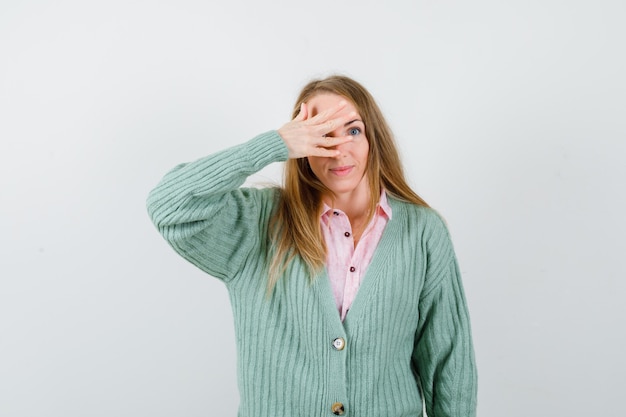 Expressive young woman posing in the studio