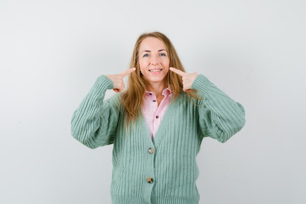 Expressive young woman posing in the studio