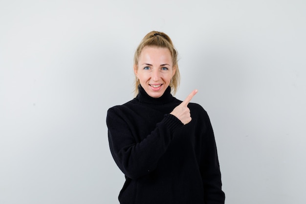 Expressive young woman posing in the studio