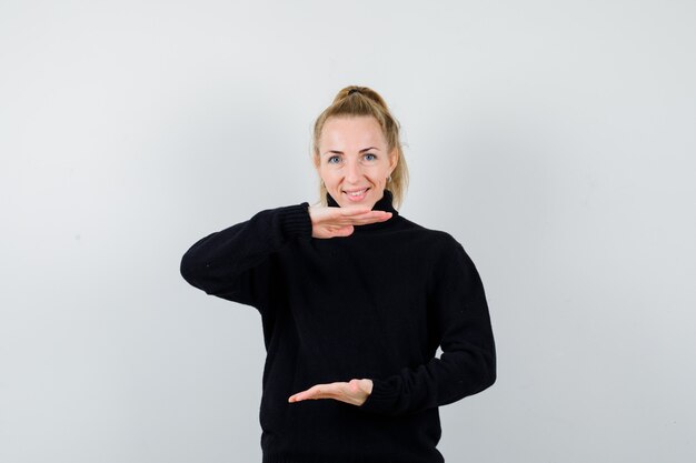 Expressive young woman posing in the studio