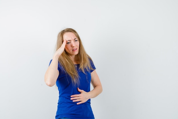 Expressive young woman posing in the studio