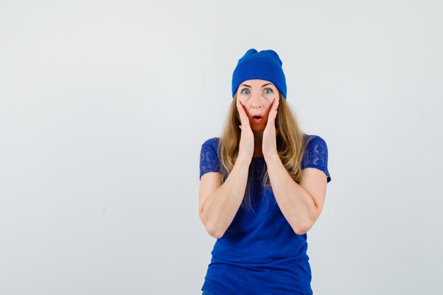 Expressive young woman posing in the studio