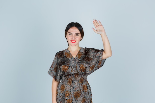 Expressive young woman posing in the studio