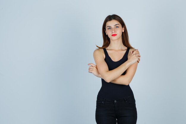 Expressive young woman posing in the studio