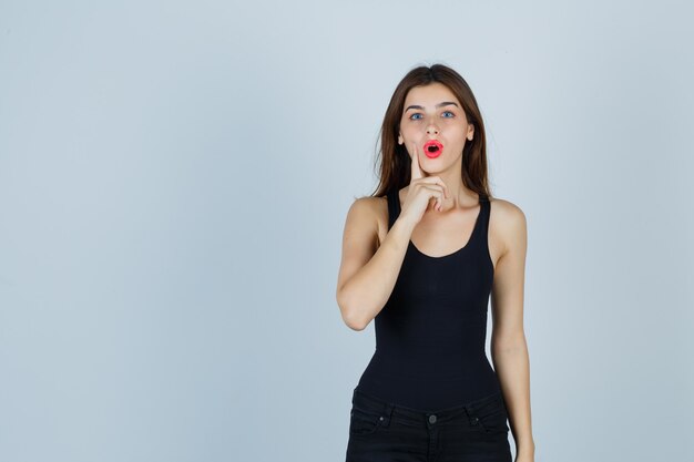 Expressive young woman posing in the studio