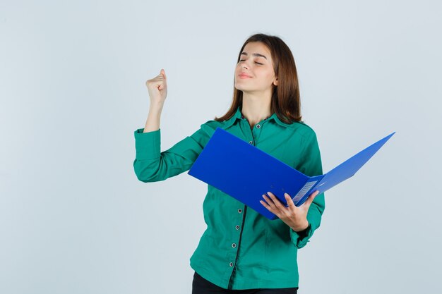 Expressive young woman posing in the studio