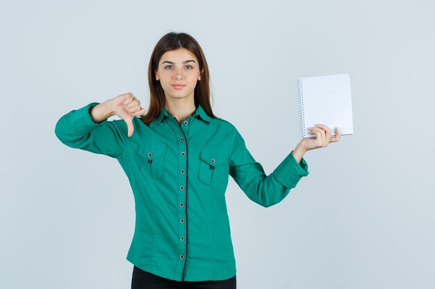 Expressive young woman posing in the studio