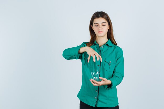 Expressive young woman posing in the studio