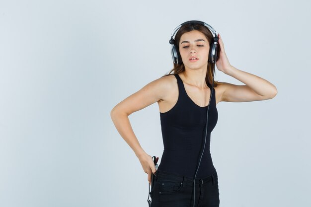 Expressive young woman posing in the studio