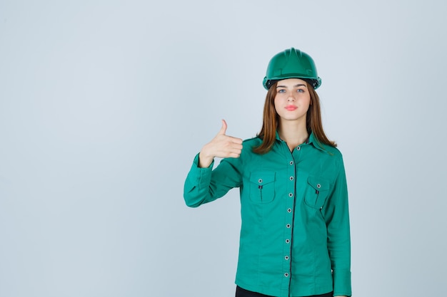 Expressive young woman posing in the studio