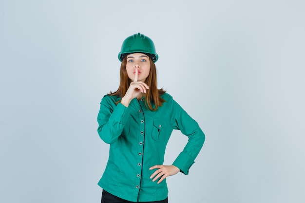 Expressive young woman posing in the studio