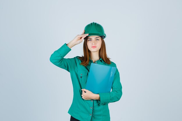 Expressive young woman posing in the studio