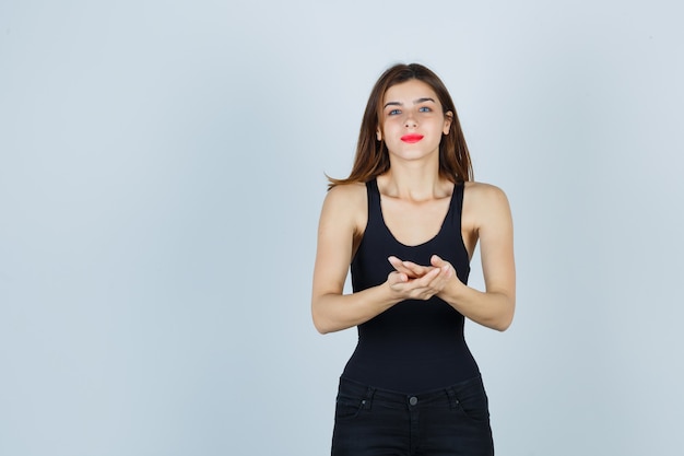 Expressive young woman posing in the studio