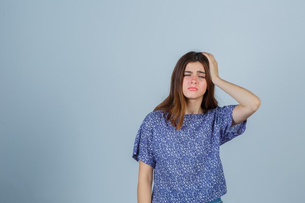 Expressive young woman posing in the studio