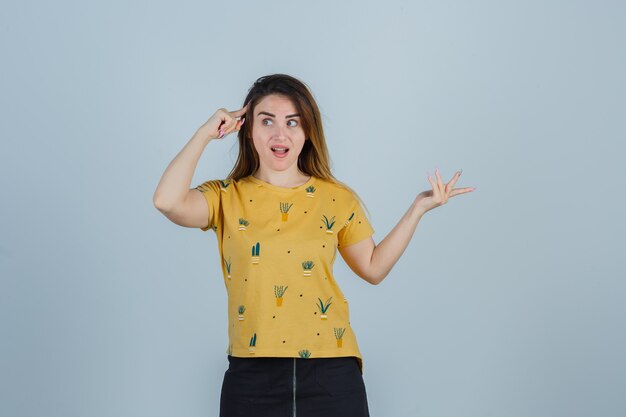 Expressive young woman posing in the studio