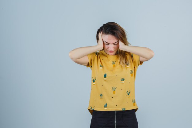 Expressive young woman posing in the studio