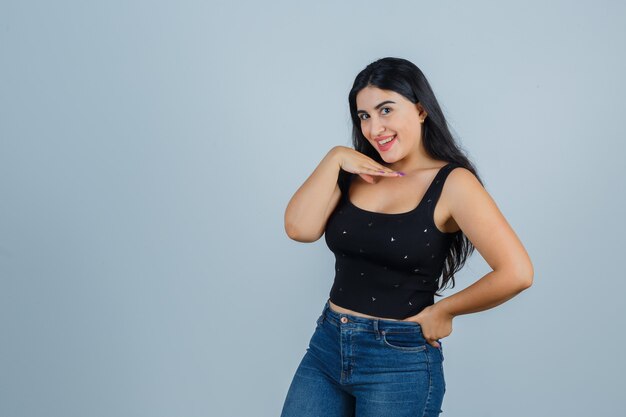 Expressive young woman posing in the studio