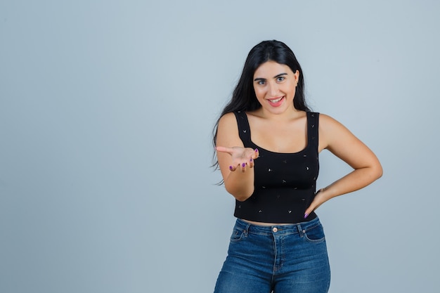 Expressive young woman posing in the studio