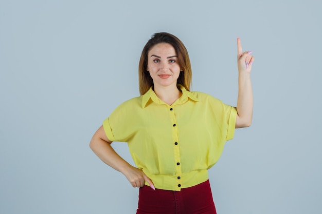 Expressive young woman posing in the studio