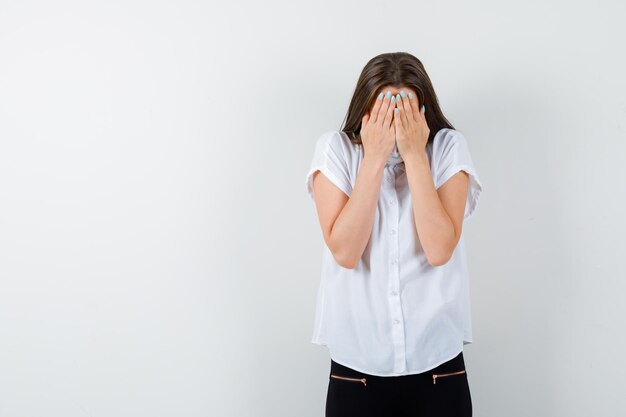 Expressive young woman posing in the studio